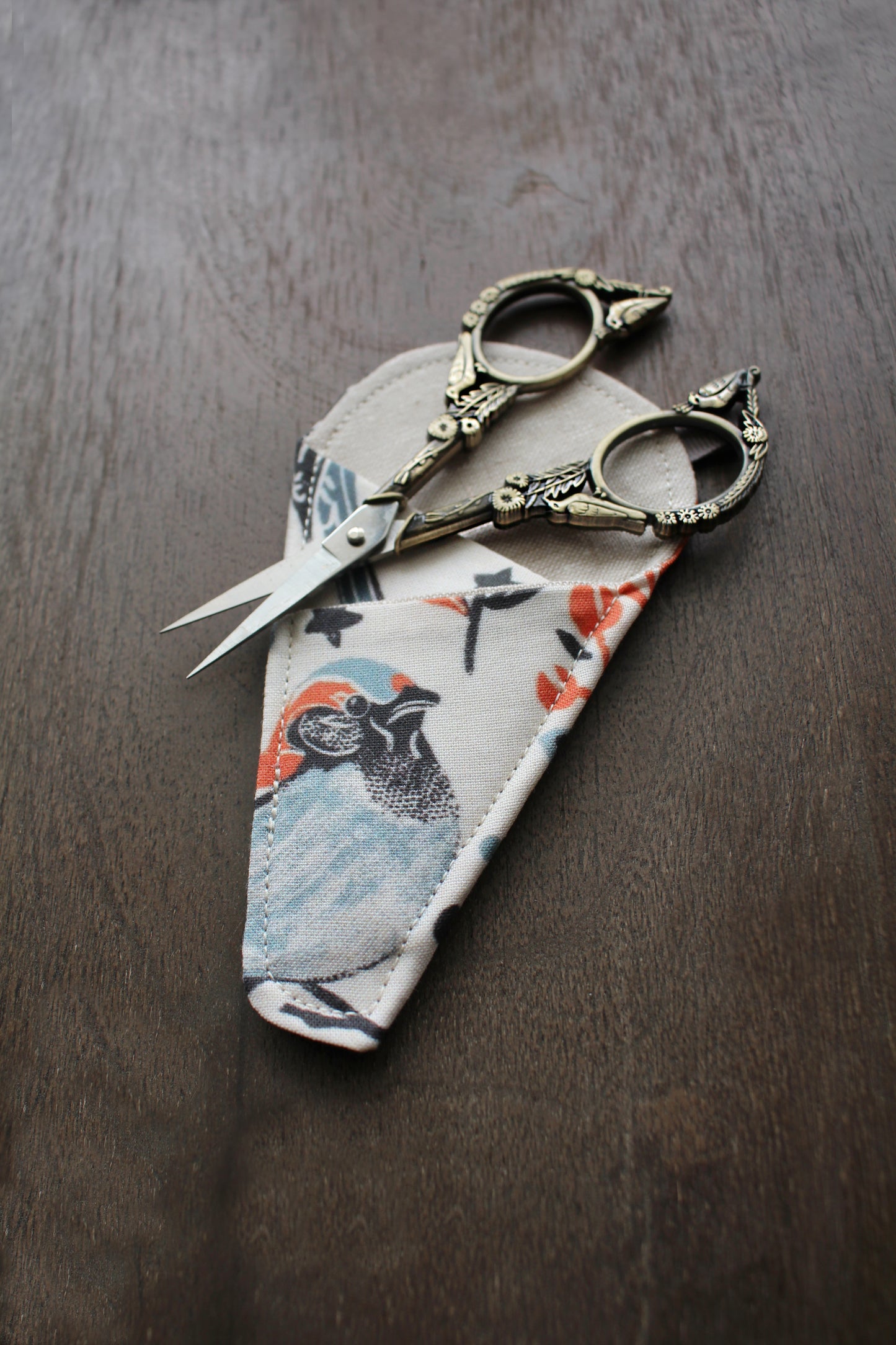 Feathered Friends Scissor Sleeve