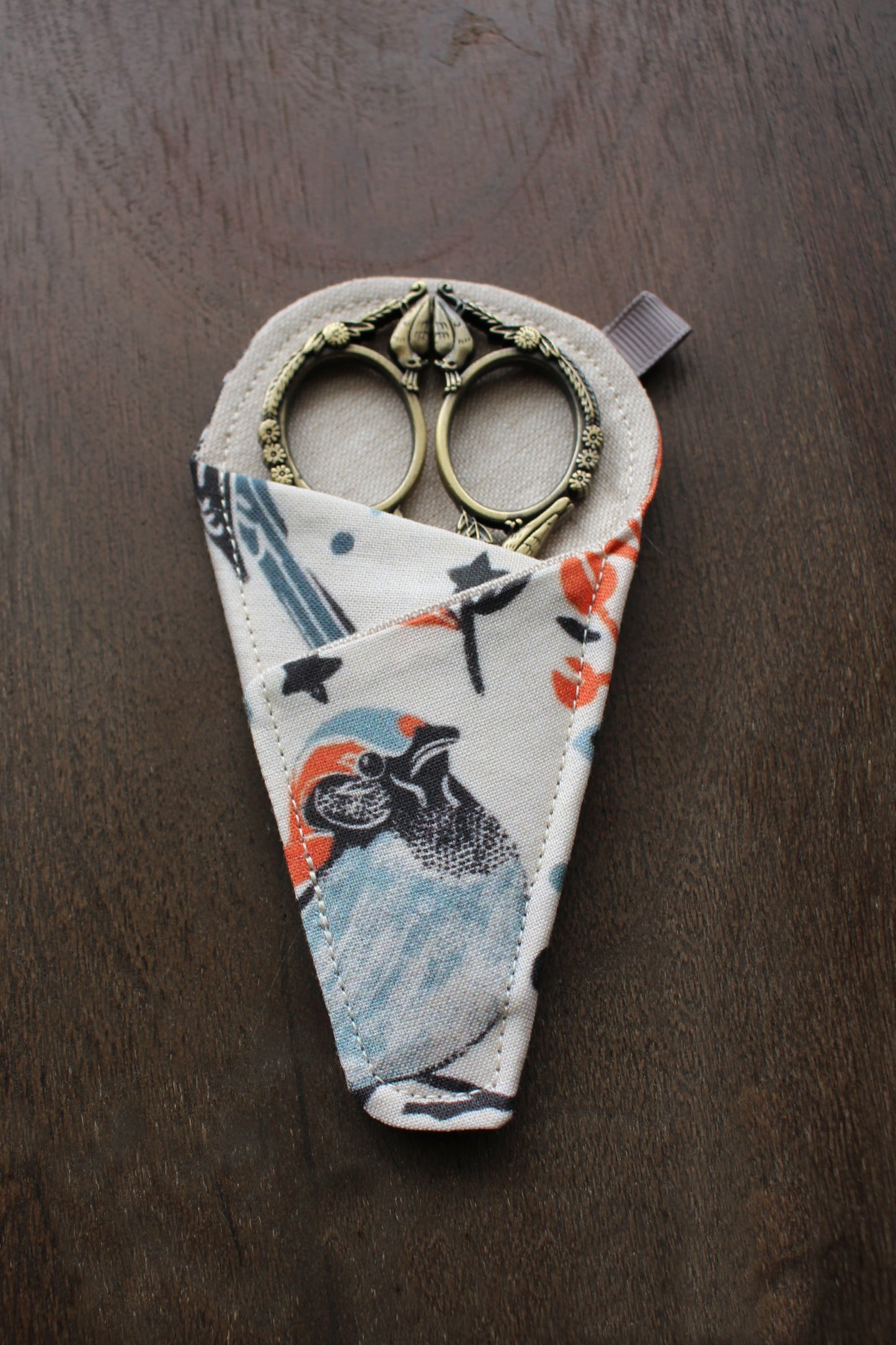 Feathered Friends Scissor Sleeve