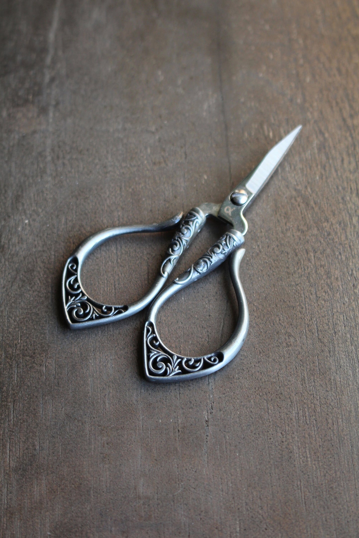 Secret Garden embroidery scissors in gunmetal gray